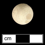 Common brown-bodied earthenware marble (mid 18th century to 1930s) - click on image to see larger view.